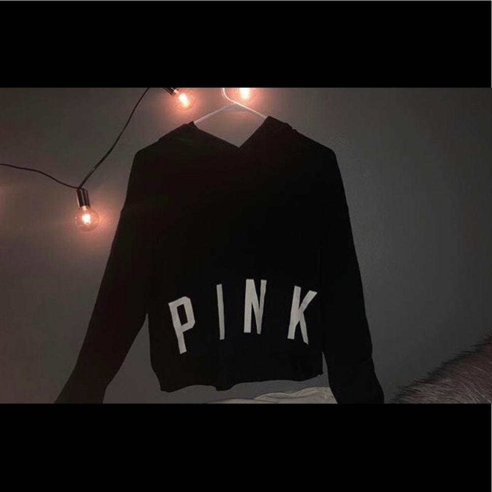 Black, vs pink hoodie.